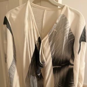 Cool flowy shirt by Yoshi Yoshi in Japan. Option to button top or leave open.